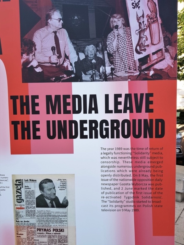 Close up of an art display honoring the 30th anniversary of the collapse of Communism across much of Eastern Europe. It reads “The Media Leave the Underground.”