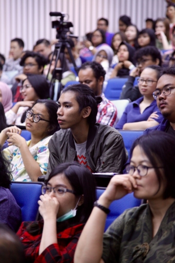 Young Muslims listening during a seminar on religion and democracy in Jakarta