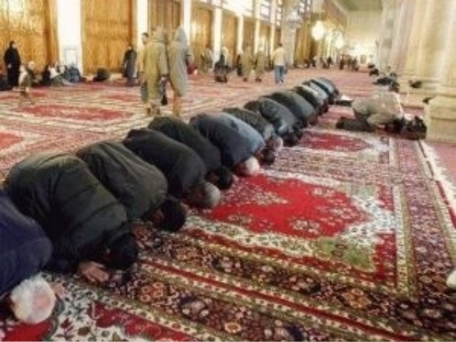 Muslims praying at a mosque