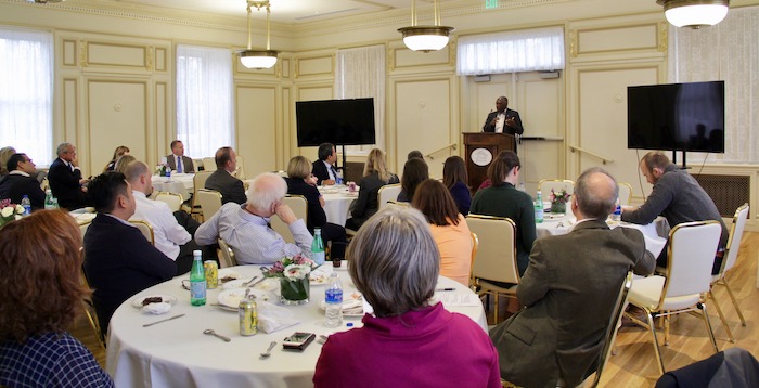 Reverend France Davis delivering his keynote speech at an IARJ conference